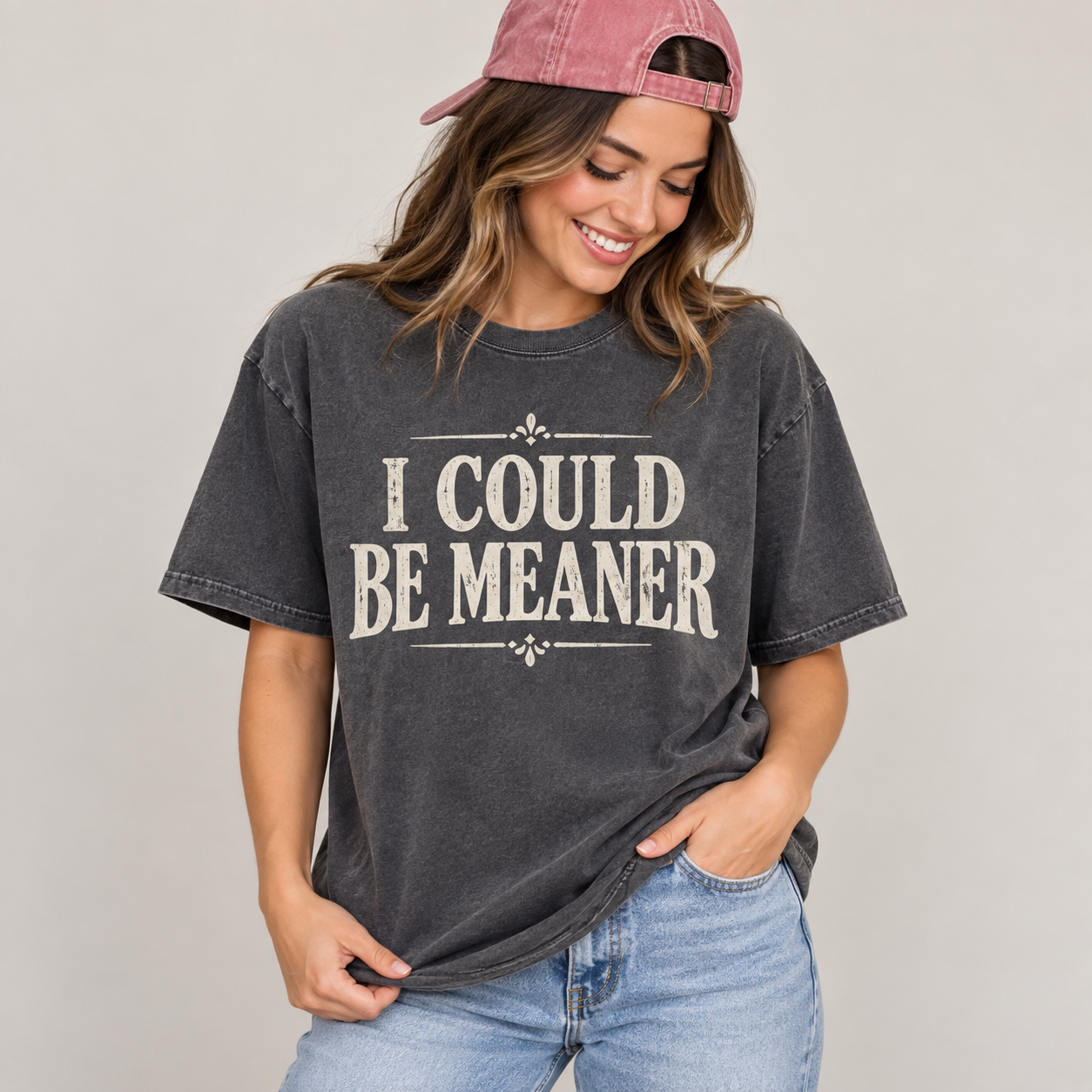 Woman wearing the I Could Be Meaner T-shirt in washed charcoal